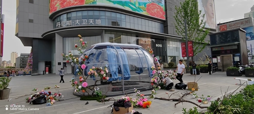Transparent dome house glowing at night in a luxury resort